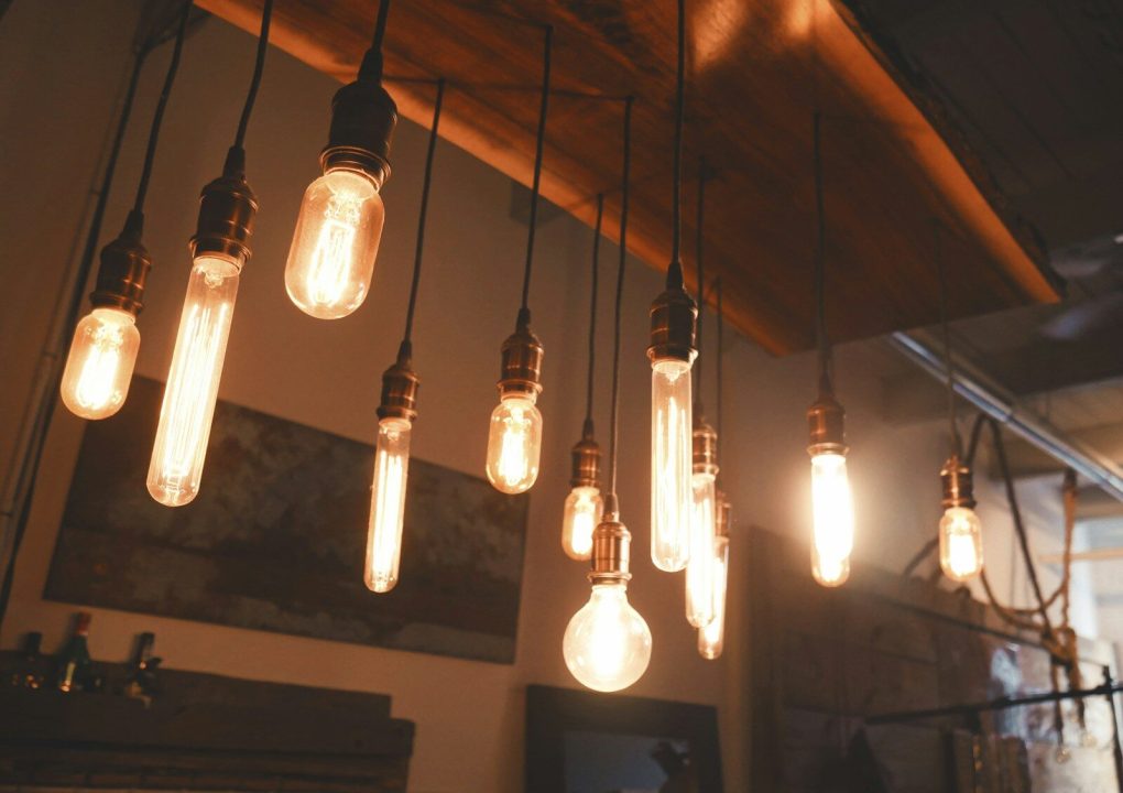 photo of edison light bulbs hang on ceiling
